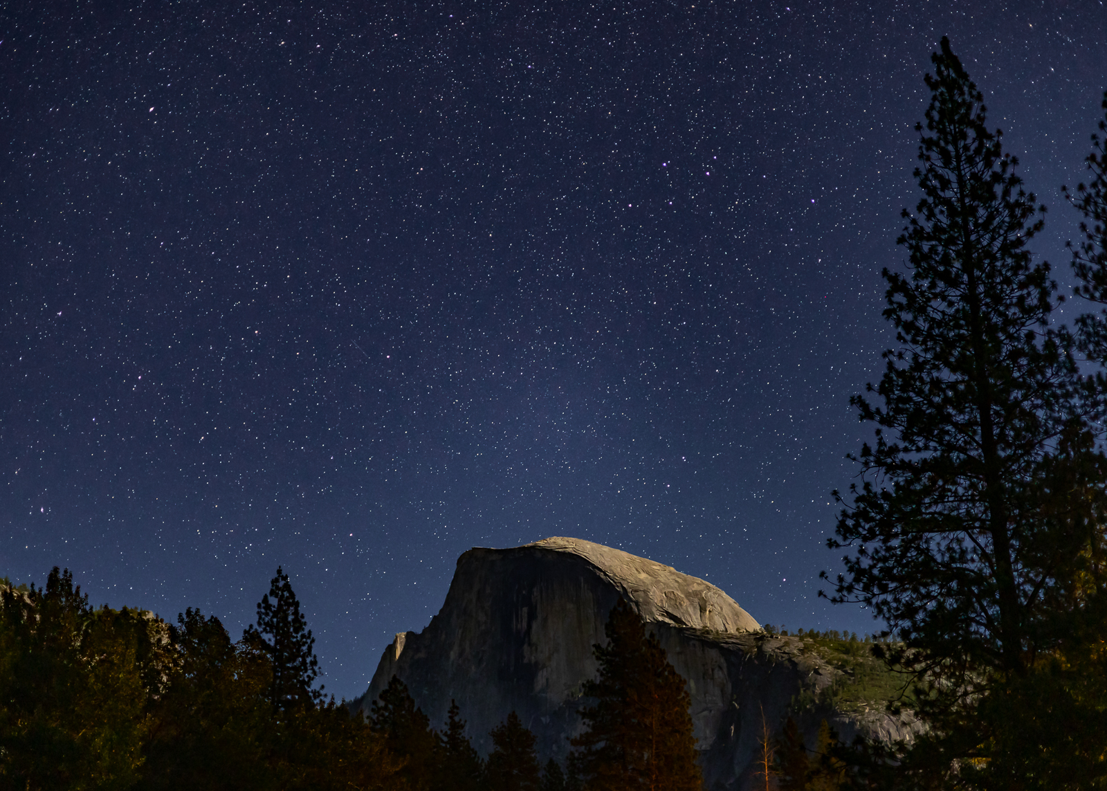Stars and Milky Way above Half Dome, Yosemite, at night